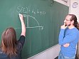 Doctoral students at the black board.
